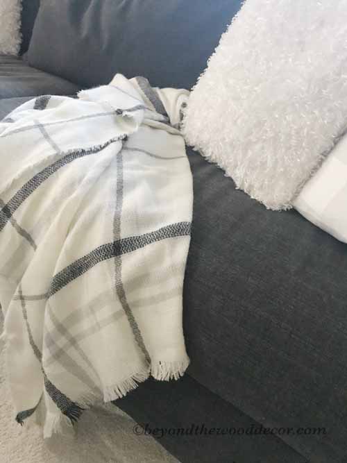 More ideas... Bring out your plaid scarfs and throw them on your furniture